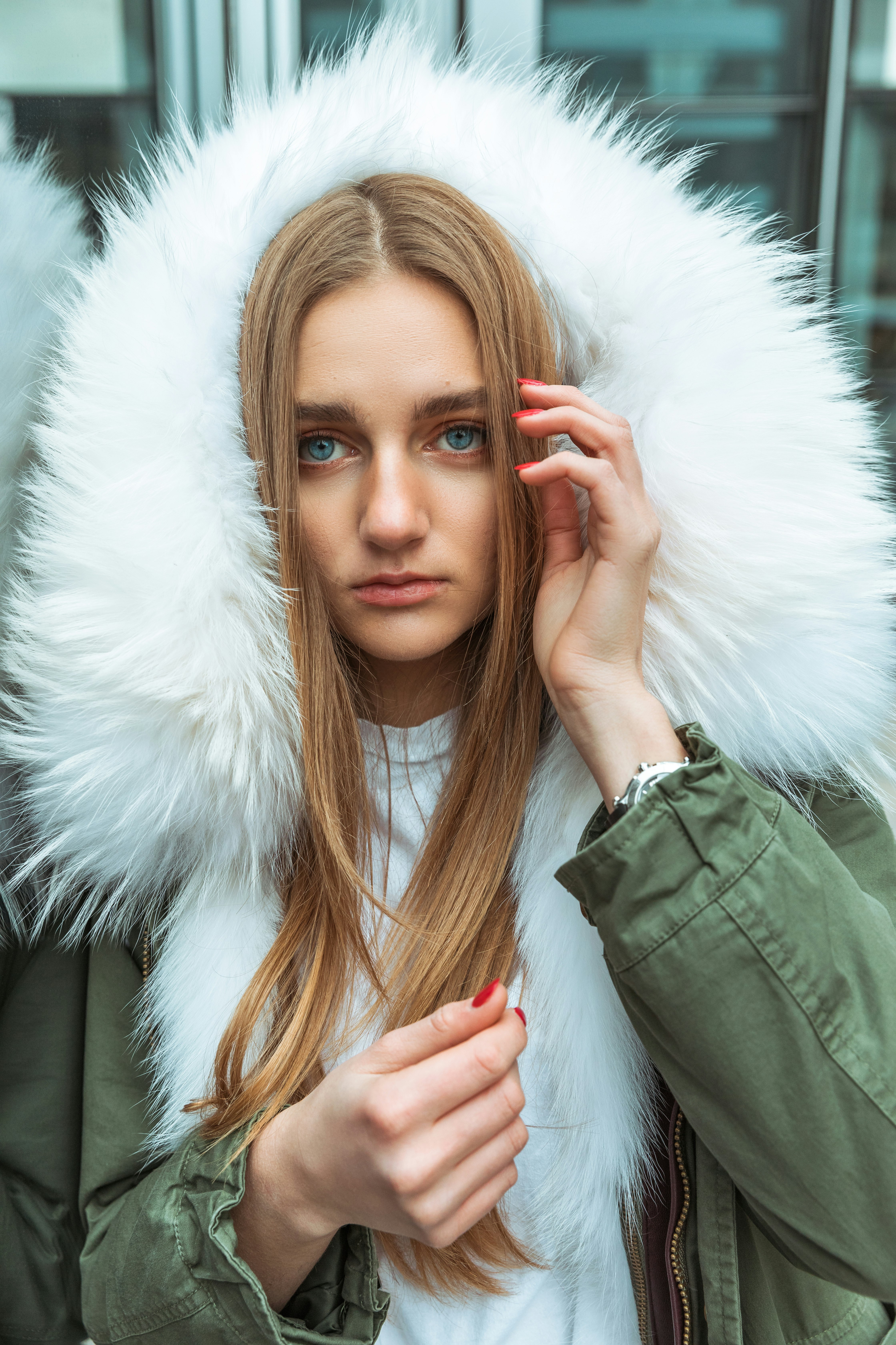 woman wearing gray and white parka jacket